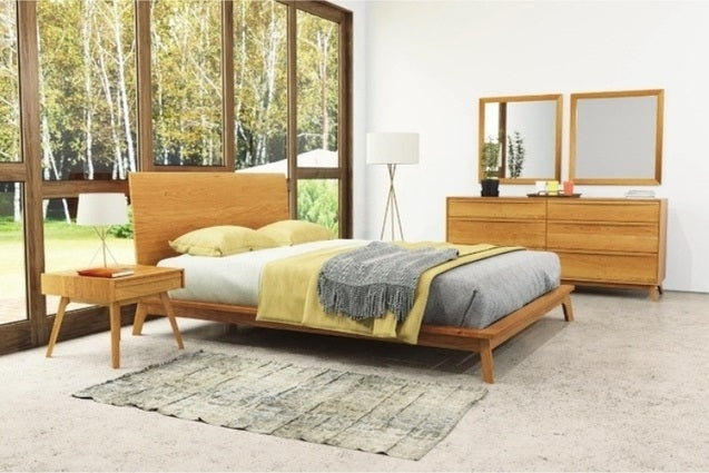 Catalina Bed in cherry in decorated room with nightstand, dresser, and mirrors