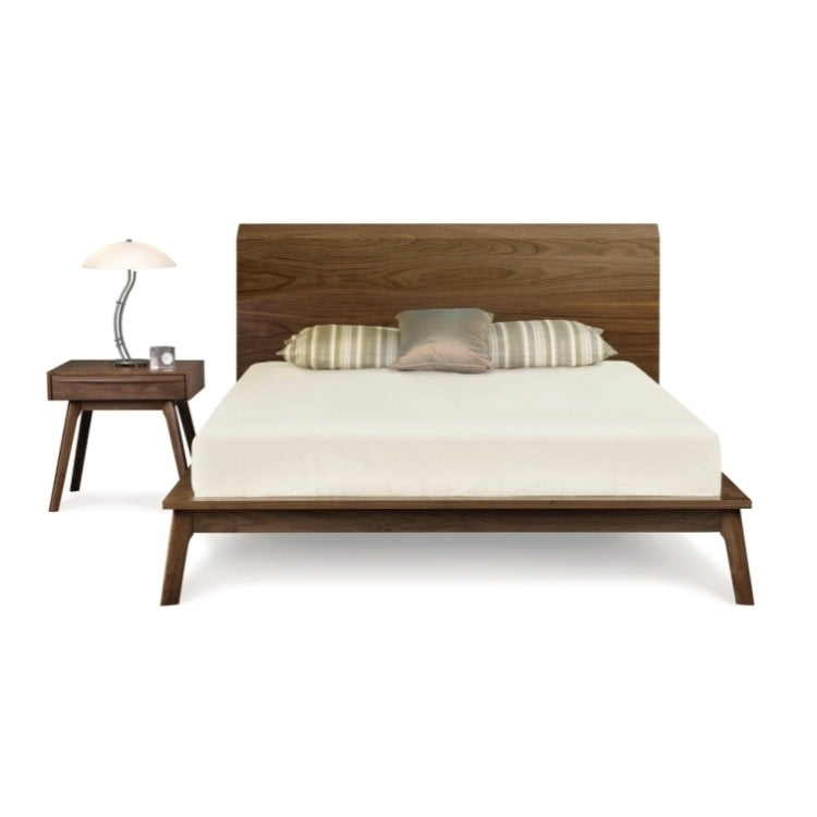 Catalina Bed in walnut, front view with nightstand