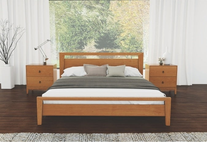 Mansfield Bed with Storage in decorated room in front of window with two 2-drawer nightstands
