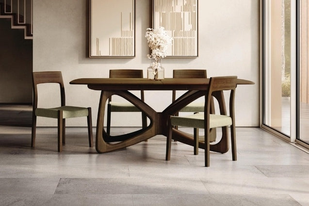 Butterfly Extension Table walnut in decorated room with chairs and a vase