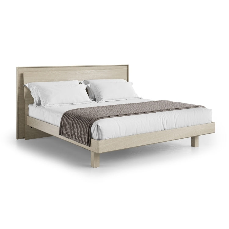 KAVA king bed in washed oak with bedding angled view