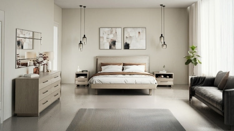 KAVA bed in washed oak in decorated bedroom with dresser, nightstands, rug, and sofa