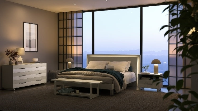 KAVA bed in washed oak with headboard lighting in decorated bedroom with dresser, bench, and nightstands