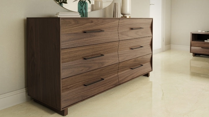 KAVA 6 drawer dresser in walnut in decorated room with vases on top near KAVA nightstand