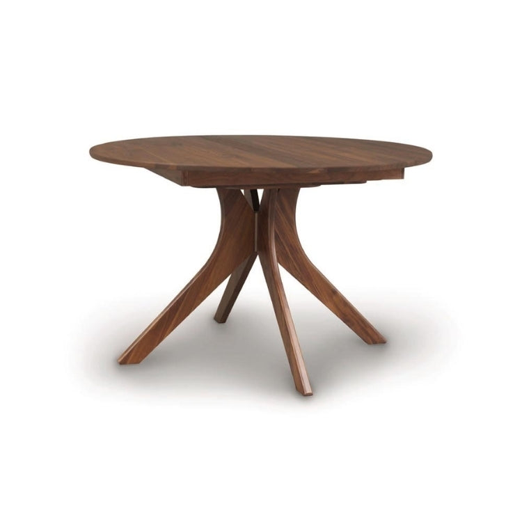 Audrey Round Extension Table in walnut, front view