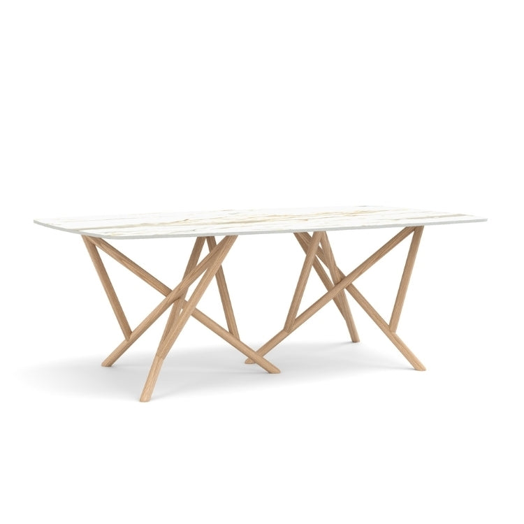 Baton Boat Shaped Stone Top Table in Macchia Vecchia with Oak base angled view