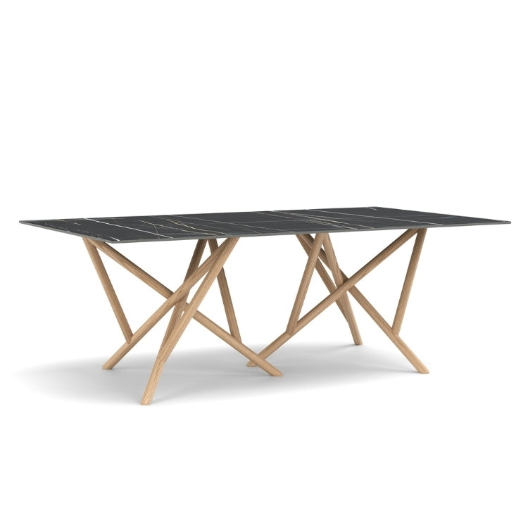 Baton Rectangle Stone Top Table in Sahara Noir with Oak base angled view