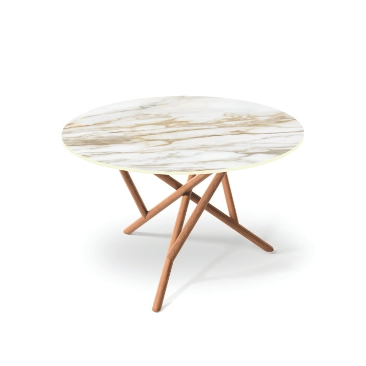 Baton Round Stone Top Table in Macchia Vecchia with Natural Cherry base top angled view