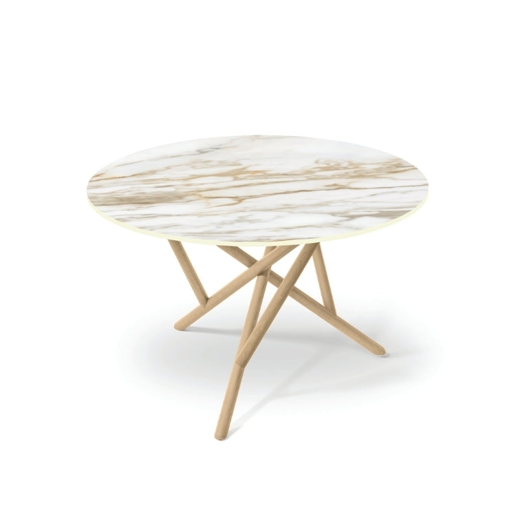 Baton Round Stone Top Table in Macchia Vecchia with Oak base top angled view