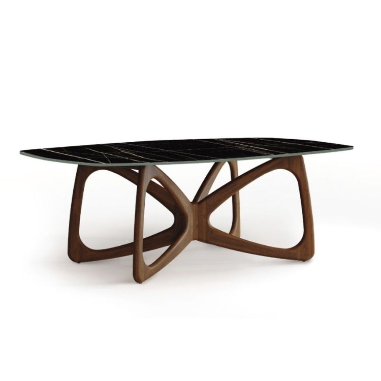 A Butterfly Sintered Stone Top Table with a sculptural wooden base and a black sintered stone tabletop.