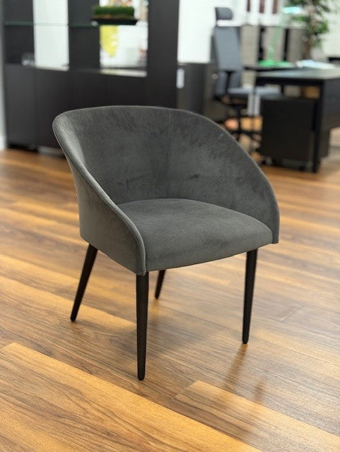 Grey upholstered chair with 4 wooden legs. Elite La Porte Dining/Occasional Chair on Clearance