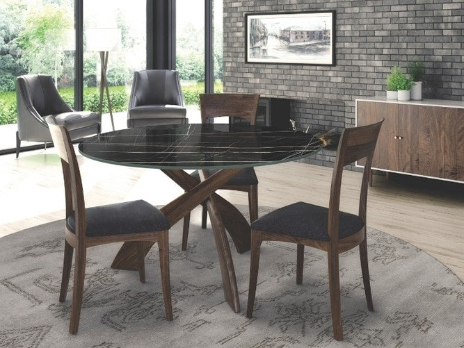 Entwine Stone Top Round Table in Natural Walnut with Sahara Noir Stone in decorated dining room with credenza and chairs.