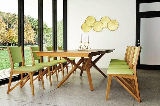 Exeter Extension Table cherry extended in a decorated room with green chairs and wall art