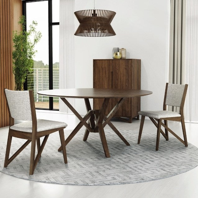Exeter Round Fixed Top Table walnut in decorated room with chairs, cabinet, and rug