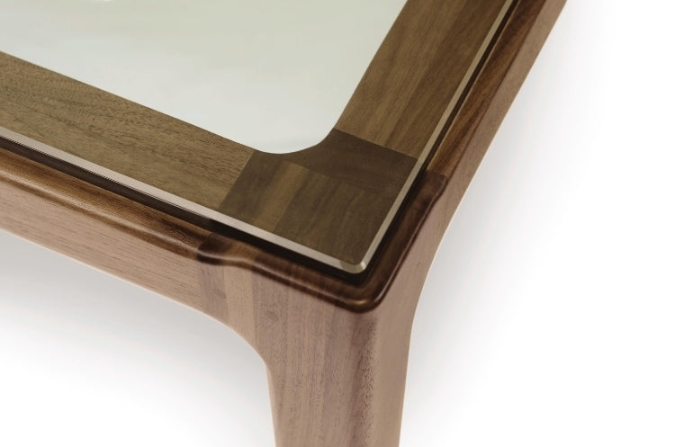 Lisse Glass Top Table close up detail of top corner showing glass and wood grain