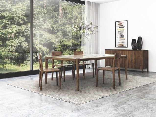 Lisse Stone Top Table in Macchia Vecchia in decorated dining room with credenza and chairs