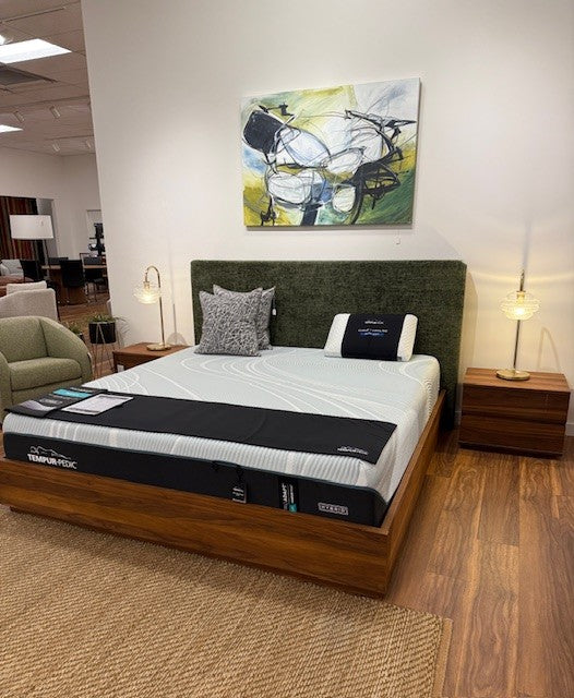 Maya King Bed with mattress display in a showroom setting