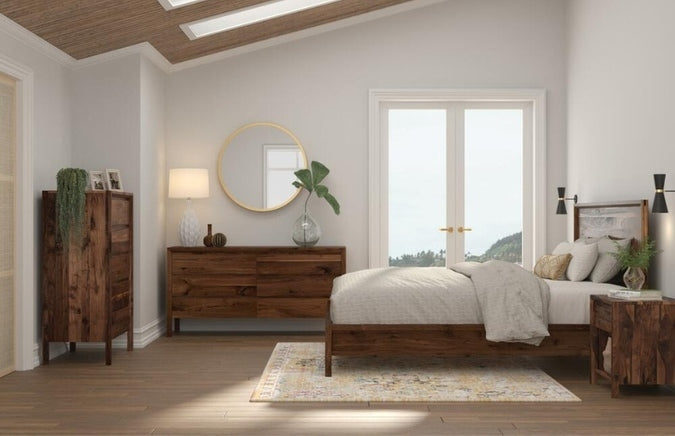 Rustic Walnut Tall Chest in decorated bedroom with bed, dresser, nightstand, and rug