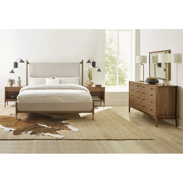 Walnut Grove 8-Drawer Dresser in decorated bedroom with mirror, bed, nightstands, and rug