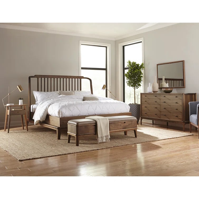 Walnut Grove 8-Drawer Dresser in decorated bedroom with bed, bench, and rug
