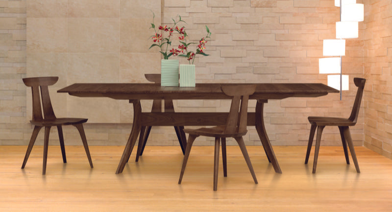Audrey Extension Table in walnut, in decorated room with chairs