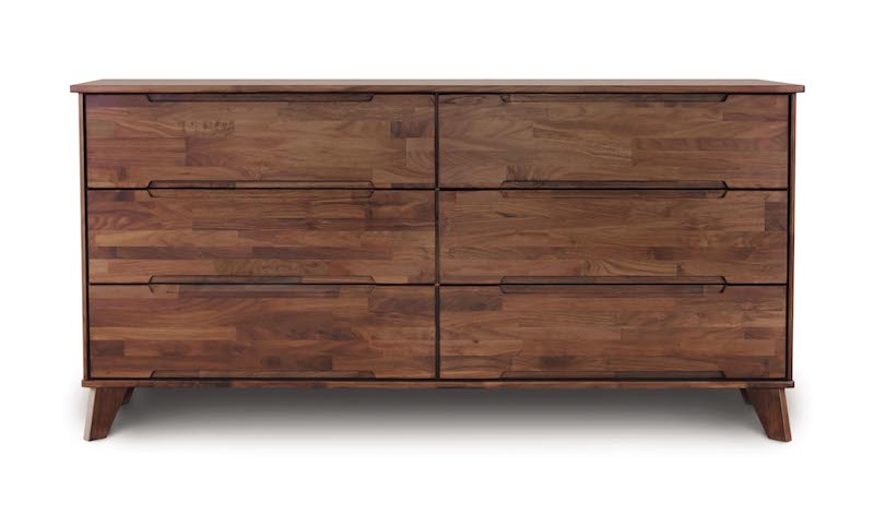 Linn Walnut wooden six drawer dresser with angled legs and recessed handles in mid century modern style.