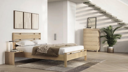 Oslo Bed in decorated room with attached nightstand, tall chest, and rug.