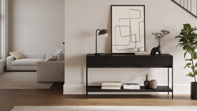 Cora 1173 Console in Charcoal Stained Ash in entry way with books and decor