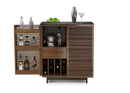 Modern wooden cabinet with horizontal slats and black base used for liquor cabinet 