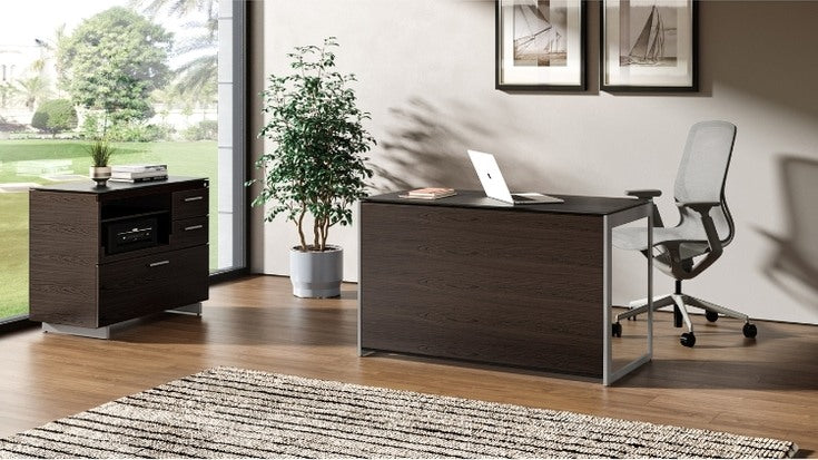 Sequel 20 6108 Compact Desk Back Panel in Charcoal Ash in home office with desk, chair, and file