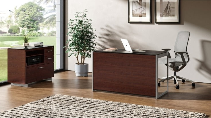 Sequel 20 6108 Compact Desk Back Panel in Chocolate Stained Walnut in home office with desk, chair, and file