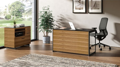 Sequel 20 6108 Compact Desk Back Panel in Walnut in home office with desk, chair, and file
