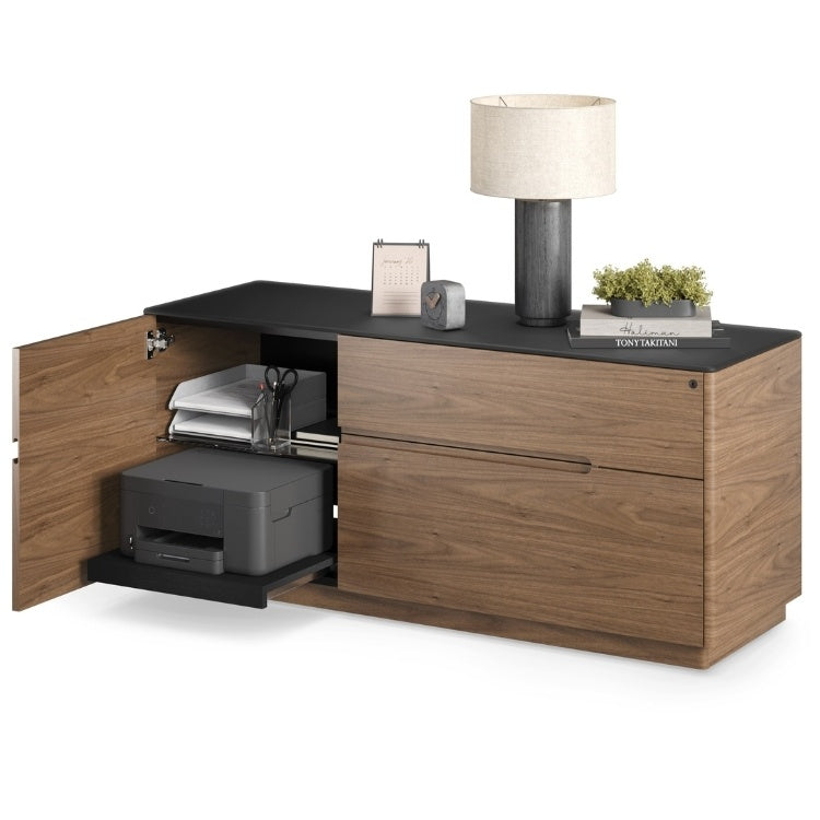 Luma 6720 Cabinet in natural walnut with black top with decor on top and cabinet door open showcasing printer drawer and office supply storage