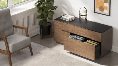 Luma 6720 Cabinet in natural walnut with black top in decorated room with drawer open to showcase file storage space