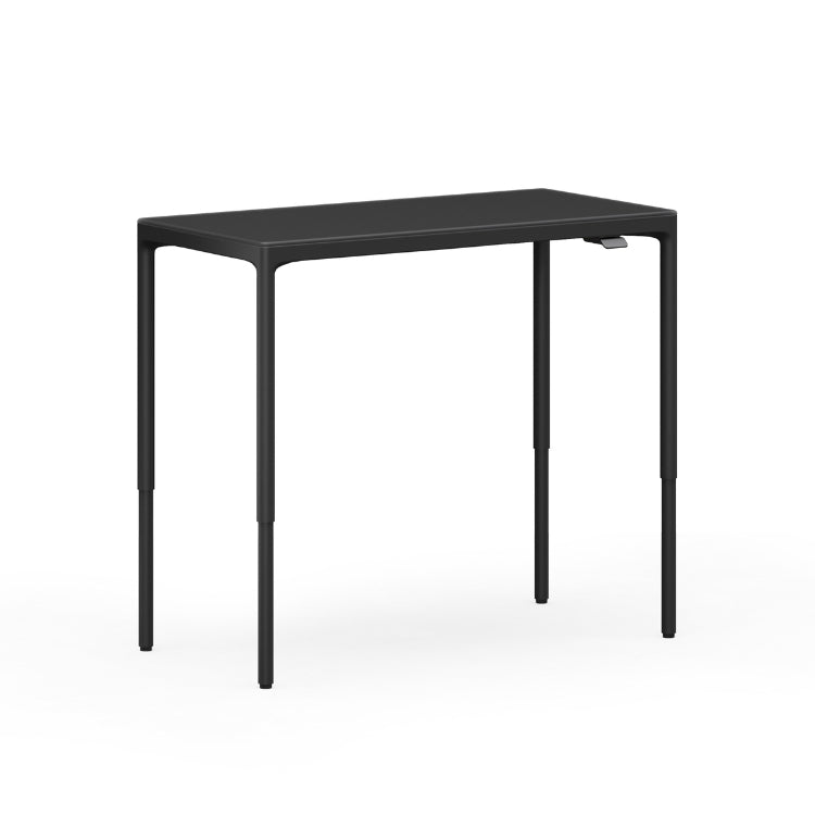 Luma Small Sit/Stand Desk in Black lifted to standing height