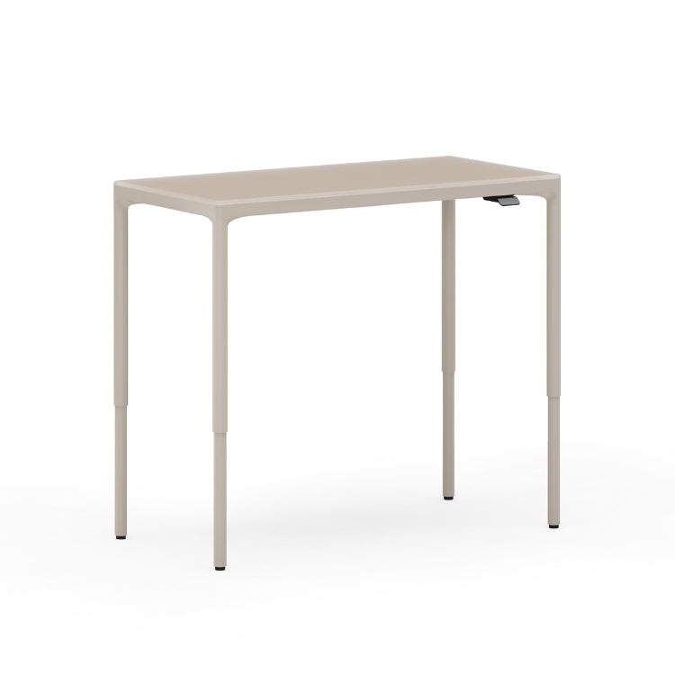 Luma Small Sit/Stand Desk in Dune lifted to standing height