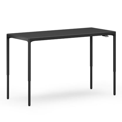 Luma Medium Sit/Stand Desk in Black at standing height