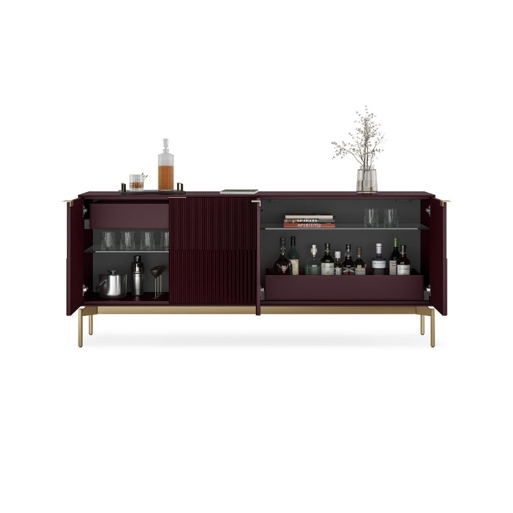 Modern sideboard with glass doors displaying bottles and glasses on a white background