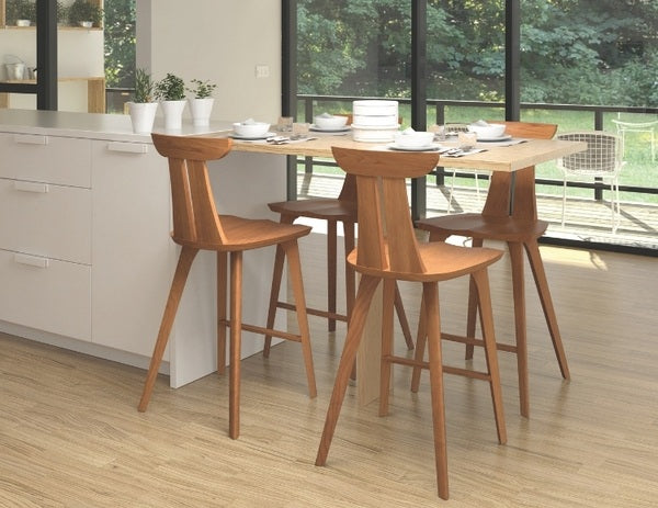 Estelle Counter Stools in cherry under counter in decorated kitchen
