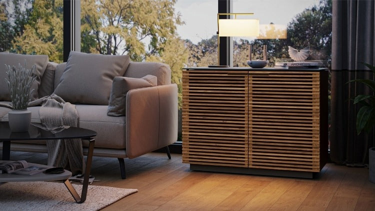 Corridor 8108 Storage Cabinet in Walnut in living room with seating, rug, and coffee table