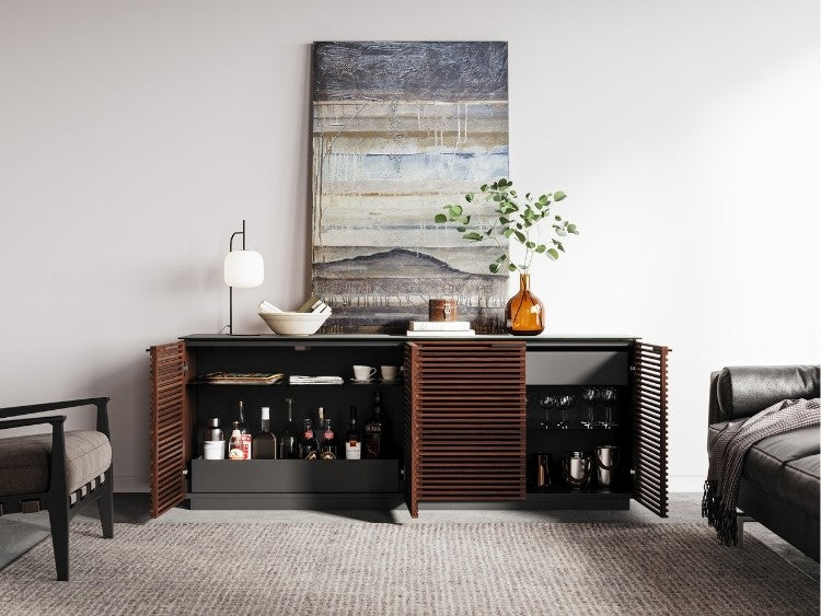 Corridor 8109 Storage Cabinet in Chocolate Walnut with open doors, bottles in pull out shelf, glasses and bar supplies on stationary shelves