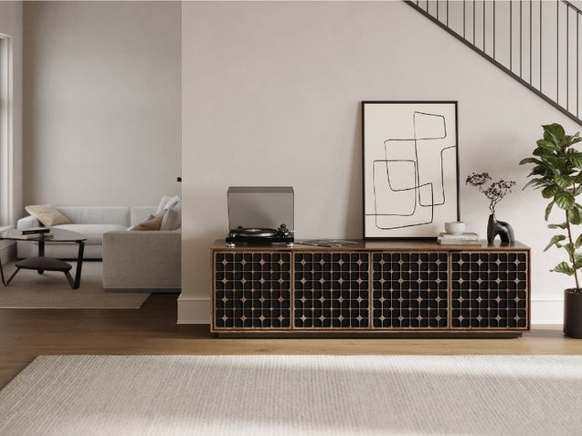 Elements 8703 Media and Storage Cabinet in Constellation Walnut in entry way with record player, decor, and rug