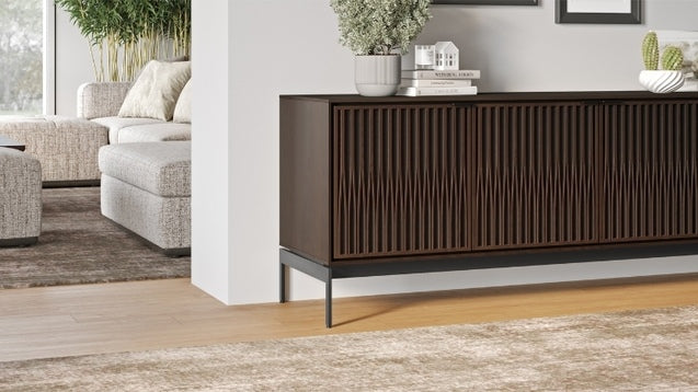 Elements 8709 Media and Storage Console in Tune Toasted Oak in hallway with decor and rug