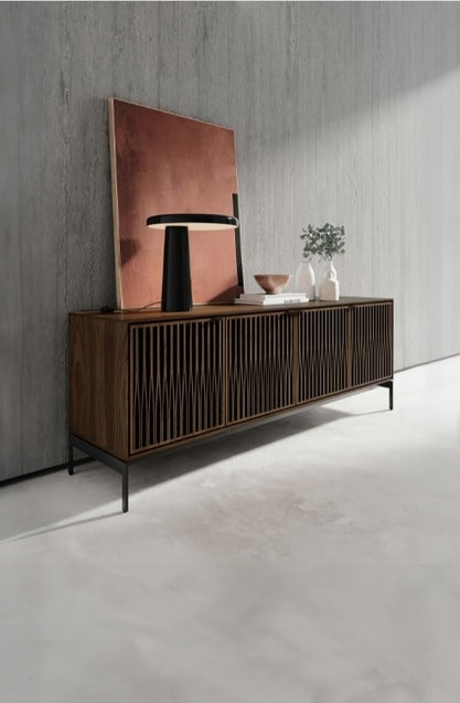 Elements 8709 Media and Storage Console in Tune Walnut in home space with decor