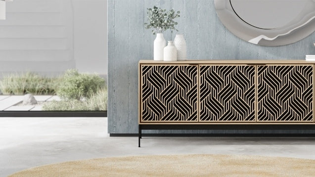 Elements 8709 Media and Storage Console in Weave Washed Oak near window with decor and rug