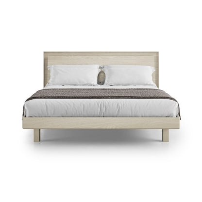 KAVA king bed in washed oak with bedding