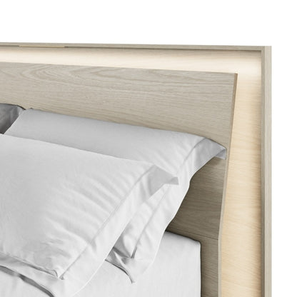 KAVA bed in washed oak close up with headboard lighting
