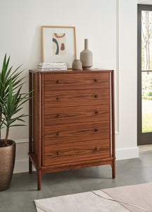 Walnut Grove 5-Drawer Tall Chest in decorated room with rug