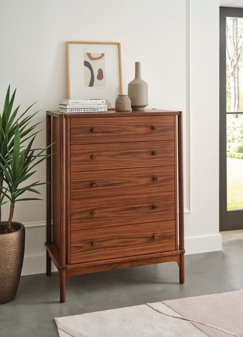 Walnut Grove 5-Drawer Tall Chest in decorated room with rug