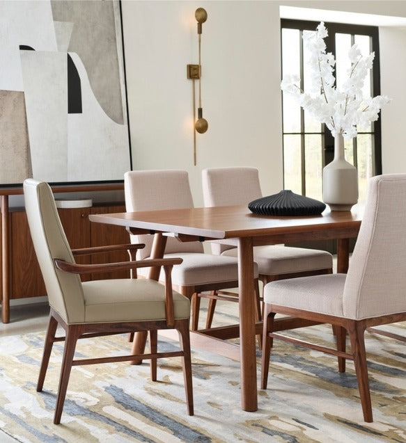 Walnut Grove Tall Upholstered Arm Chair in decorated dining room with credenza, table, and rug
